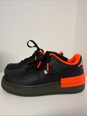 Nike Woman’s Black & Orange Air Force 1 Limited Edition (size 7.5)